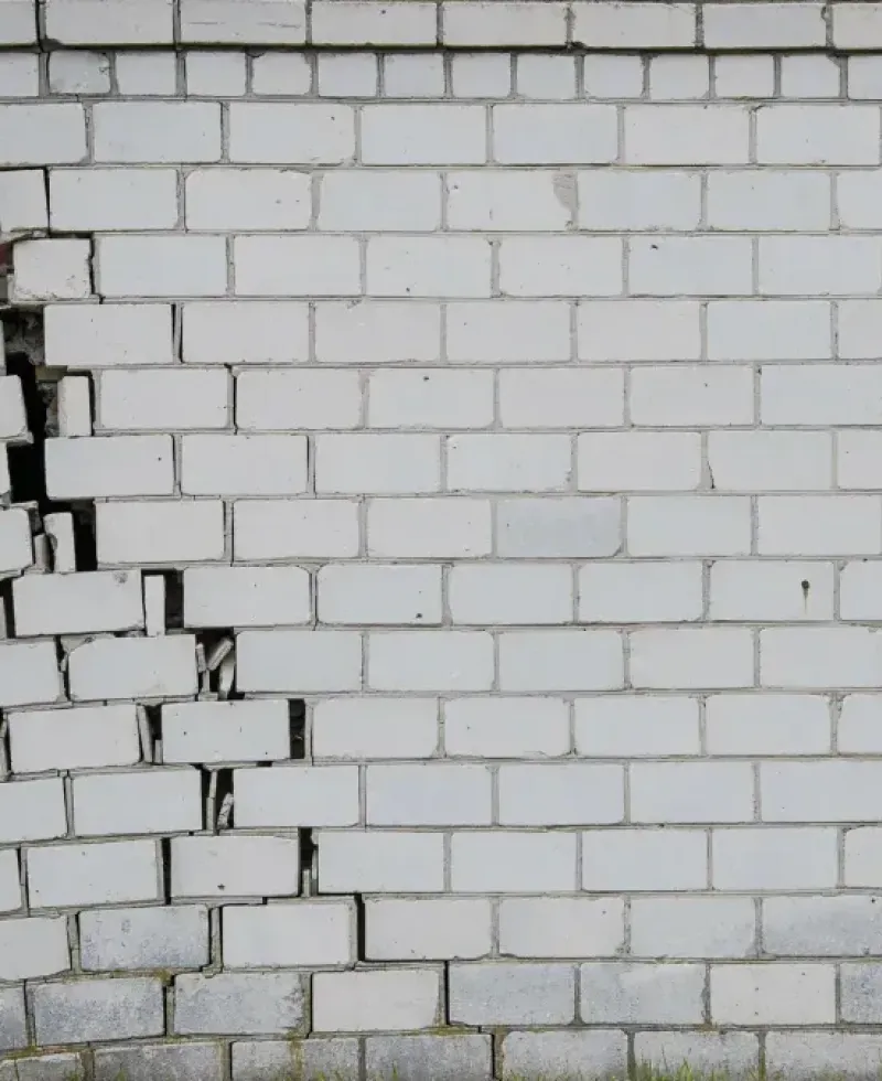 Foundation problem is causing this brick wall to fail.