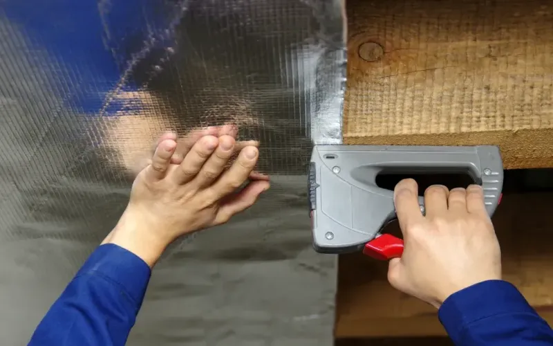 A moisture barrier installed in subfloor or basement.