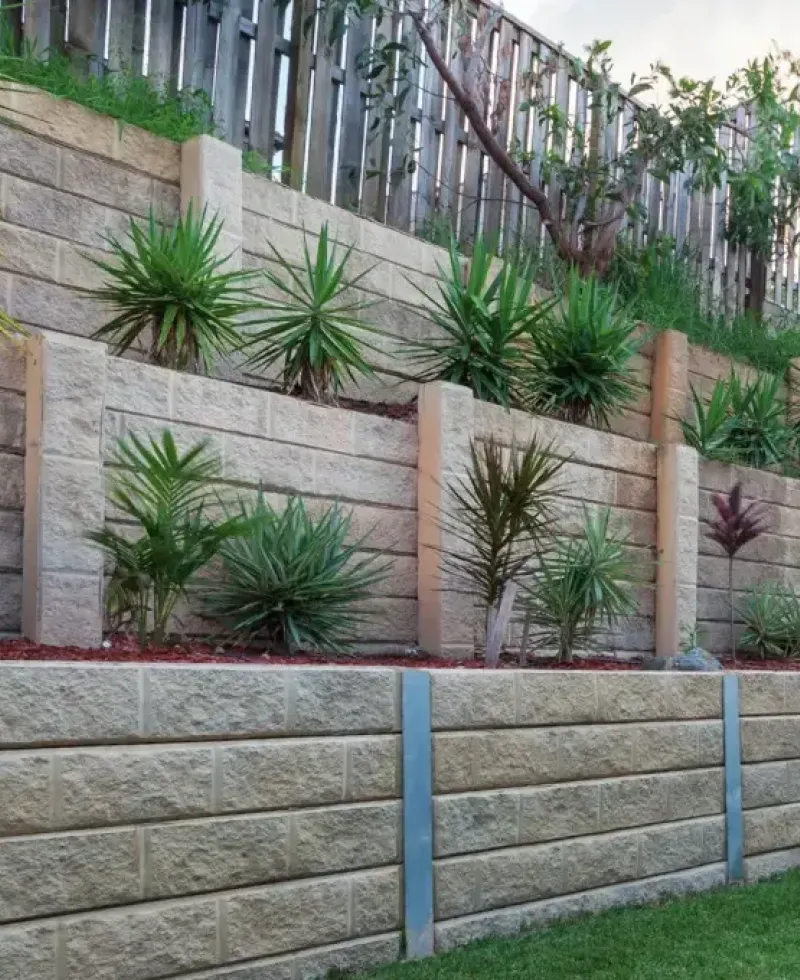 Beautiful brick retaining wall in a landscaped property.