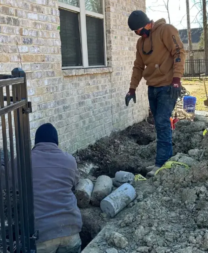 Installing piers under a foundation in Knoxville.